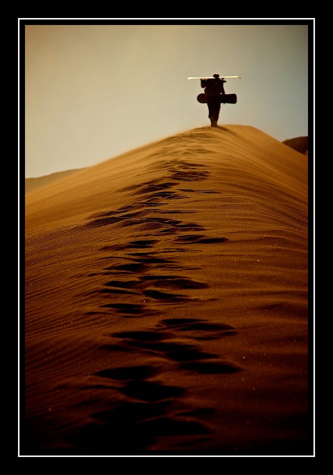 Sand surfing